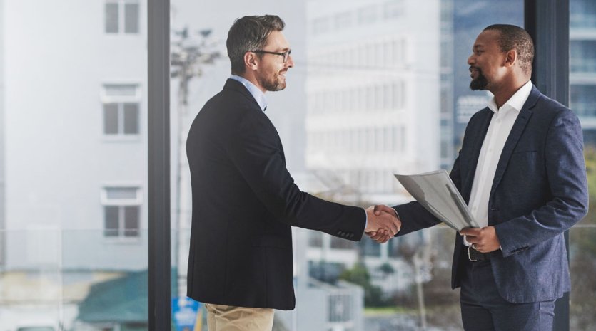 two business men shaking hands